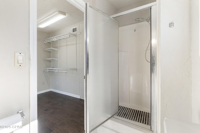 bathroom featuring wood-type flooring