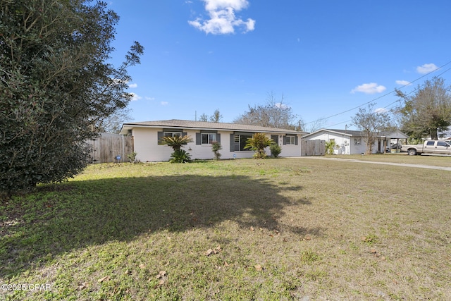 ranch-style house with a front yard