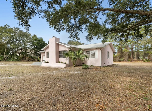 exterior space with a lawn