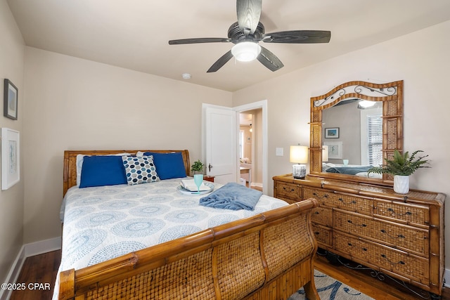 bedroom featuring hardwood / wood-style floors and ceiling fan