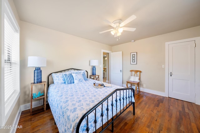 bedroom with ceiling fan and dark hardwood / wood-style flooring