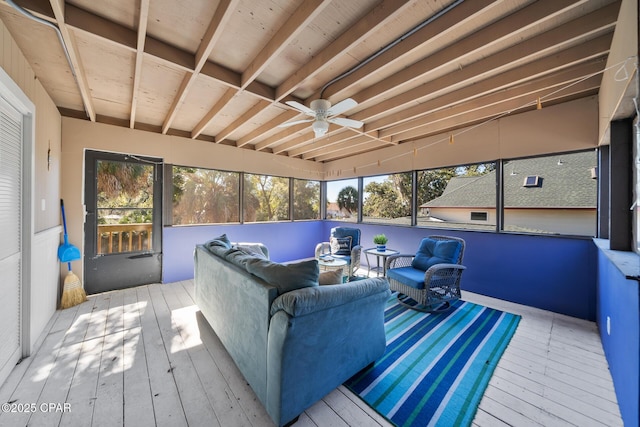 sunroom featuring a wealth of natural light and ceiling fan