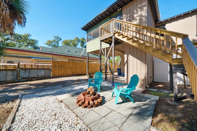 view of patio featuring an outdoor fire pit