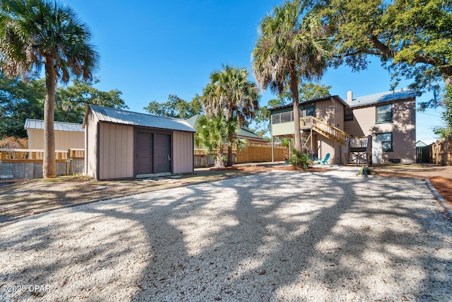 exterior space featuring a storage unit