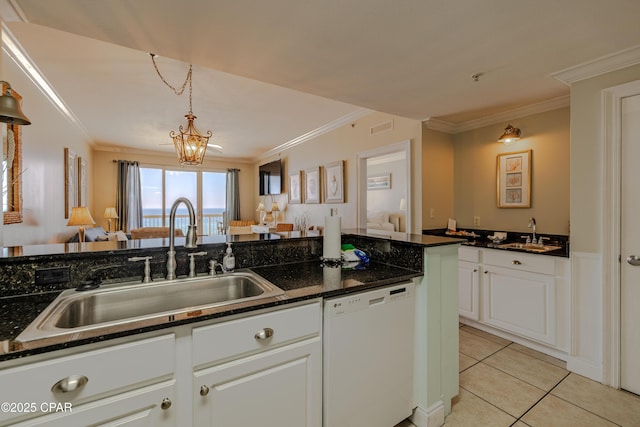 kitchen with visible vents, white dishwasher, a sink, and light tile patterned floors