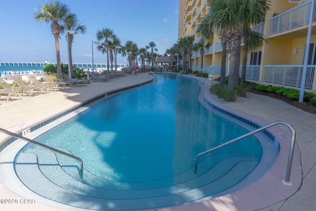 community pool with a patio