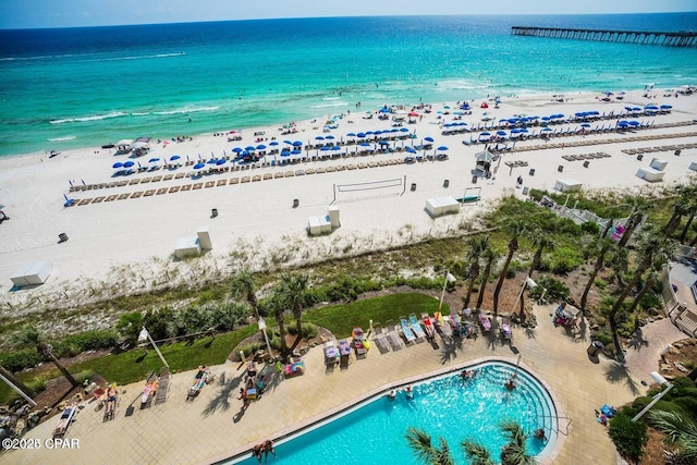 aerial view with a beach view and a water view