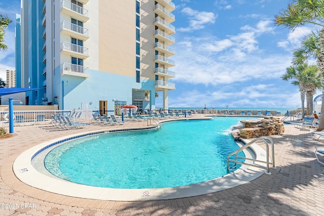 pool with a patio