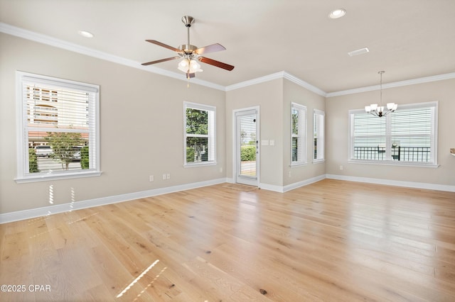 unfurnished living room featuring baseboards, ornamental molding, recessed lighting, light wood-style floors, and ceiling fan with notable chandelier