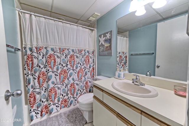 full bath with visible vents, toilet, vanity, and shower / bathtub combination with curtain