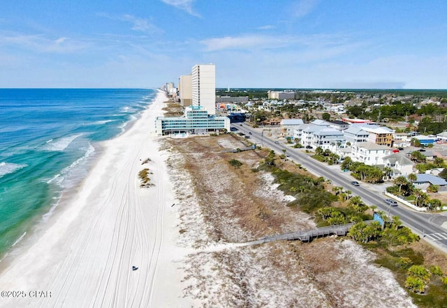 bird's eye view featuring a beach view and a water view