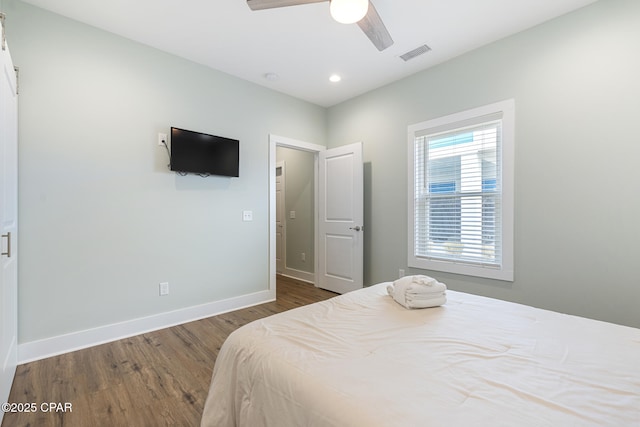 bedroom with visible vents, dark wood-style floors, recessed lighting, baseboards, and ceiling fan