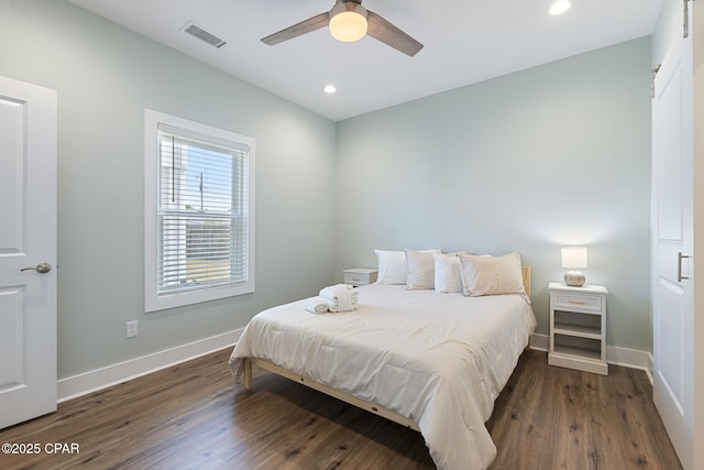 bedroom featuring visible vents, recessed lighting, baseboards, and wood finished floors