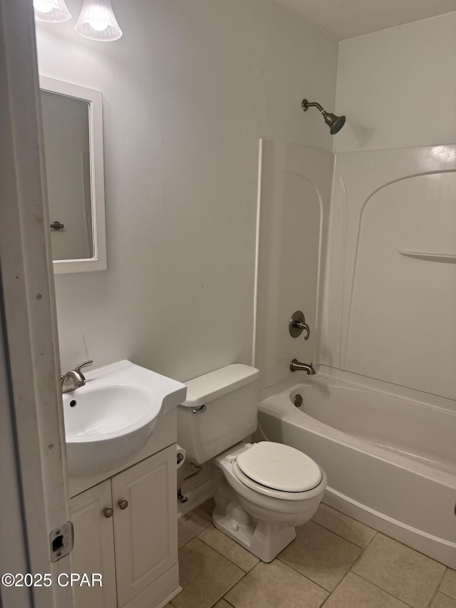 full bathroom with tile patterned floors, vanity, shower / bathtub combination, and toilet