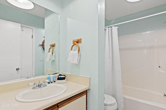 full bathroom featuring vanity, toilet, and shower / bath combo with shower curtain