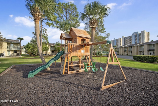 view of playground with a yard