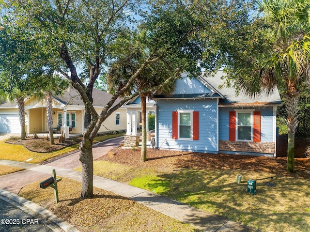 view of front of house featuring driveway and an attached garage