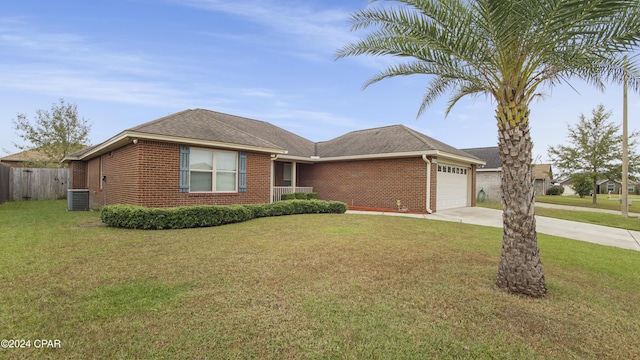 single story home featuring a garage, brick siding, fence, driveway, and a front lawn