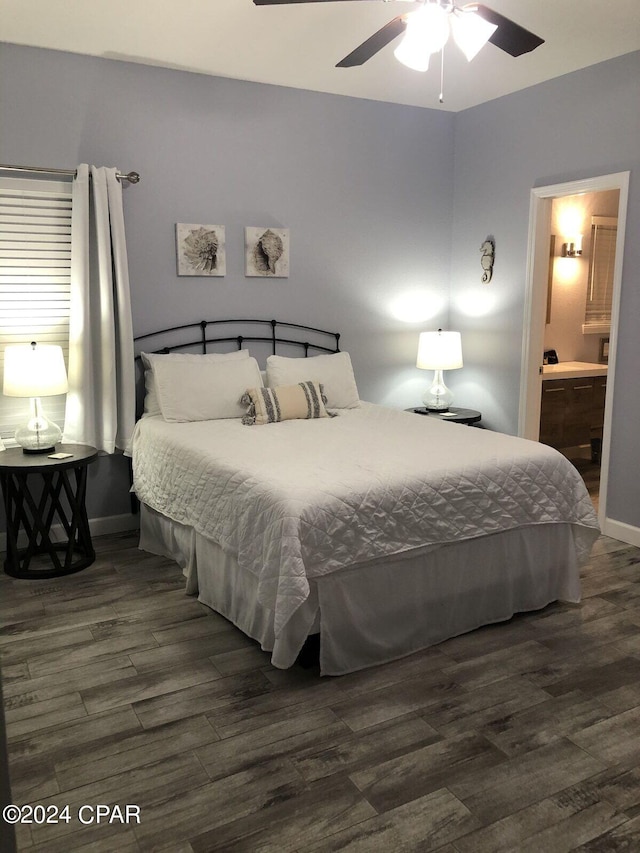 bedroom featuring ensuite bathroom, dark hardwood / wood-style floors, and ceiling fan