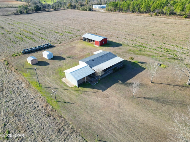 birds eye view of property featuring a rural view