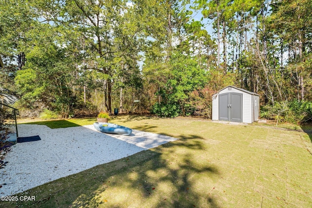 view of yard with a storage unit and an outdoor structure