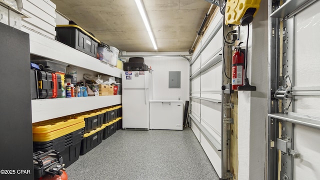 interior space with a garage and electric panel