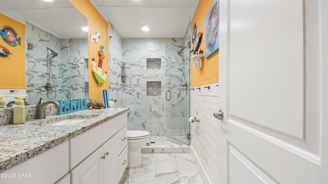 full bathroom with marble finish floor, a shower stall, toilet, and vanity