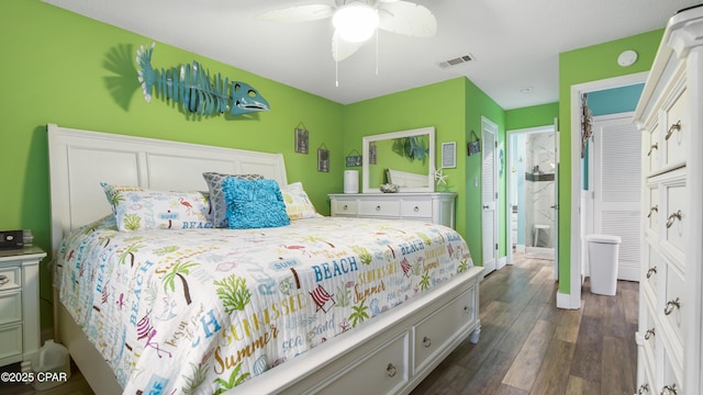 bedroom with dark wood-style floors, baseboards, visible vents, and a ceiling fan