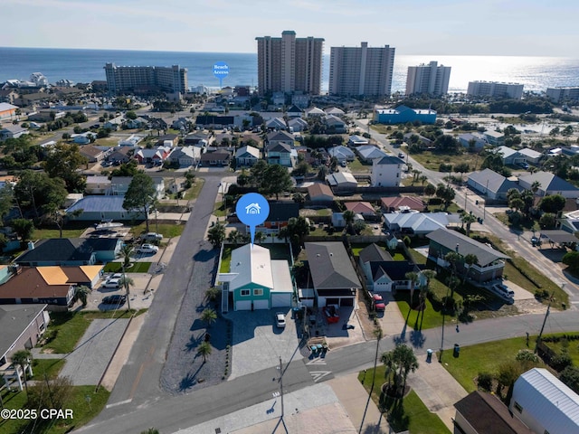 drone / aerial view featuring a water view and a city view