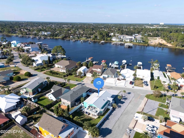 aerial view with a residential view and a water view