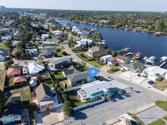 birds eye view of property featuring a water view and a residential view