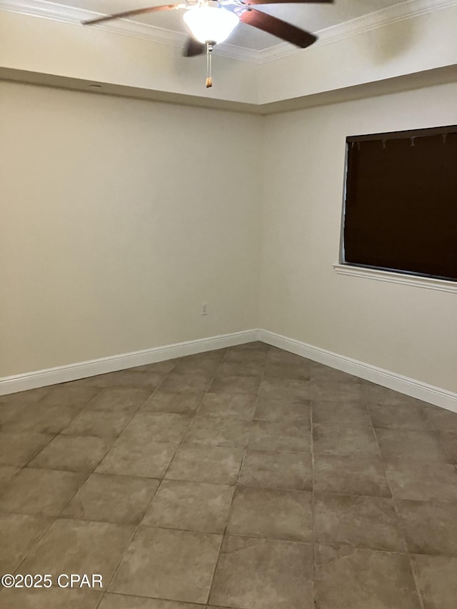 tiled empty room featuring baseboards, ceiling fan, and ornamental molding