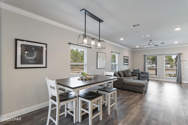 dining space featuring crown molding, recessed lighting, visible vents, dark wood-type flooring, and baseboards