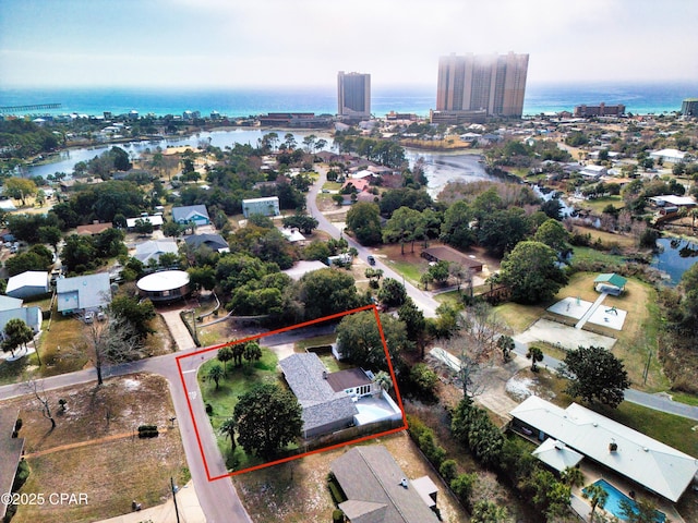 birds eye view of property featuring a water view