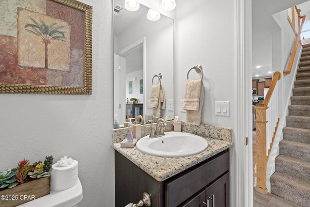 4701 Maegans Ridge Rd, Panama City, FL 32404 - bathroom featuring vanity, curtained shower, and toilet