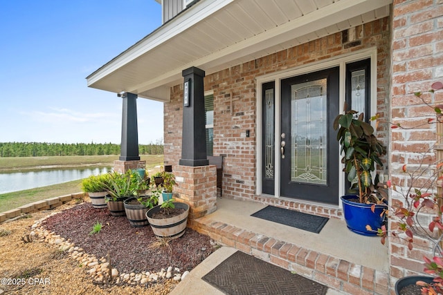 4701 Maegans Ridge Rd, Panama City, FL 32404 - view of front facade with brick siding, a garage, a front lawn, and driveway