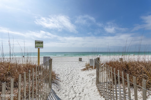 view of water feature with a beach view