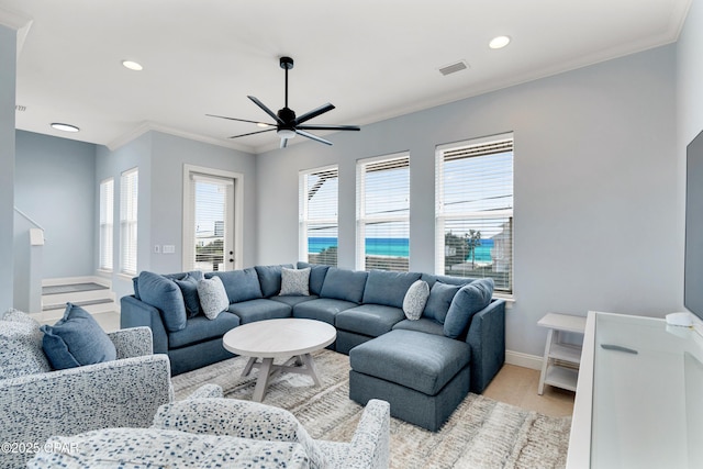 living room featuring baseboards, visible vents, a ceiling fan, ornamental molding, and recessed lighting