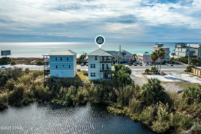 exterior space with a water view