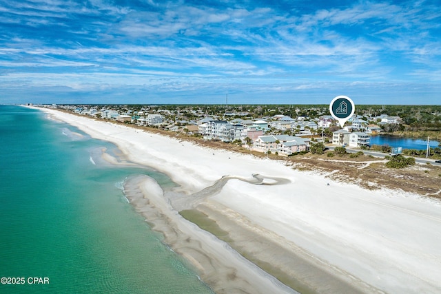 bird's eye view with a water view and a view of the beach