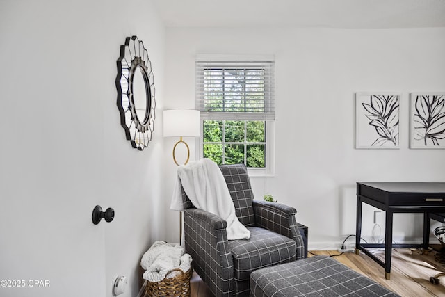 sitting room featuring hardwood / wood-style flooring