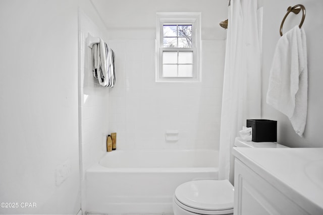 full bathroom featuring shower / bath combination with curtain, vanity, and toilet