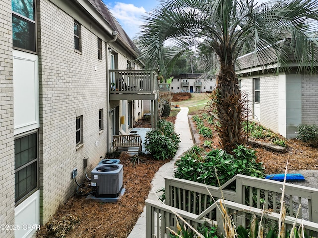 view of yard with central air condition unit