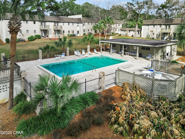 view of swimming pool with a patio