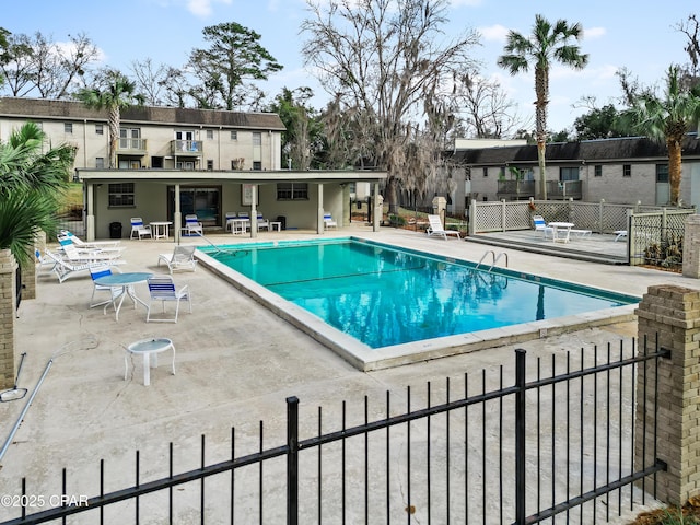 view of pool featuring a patio area