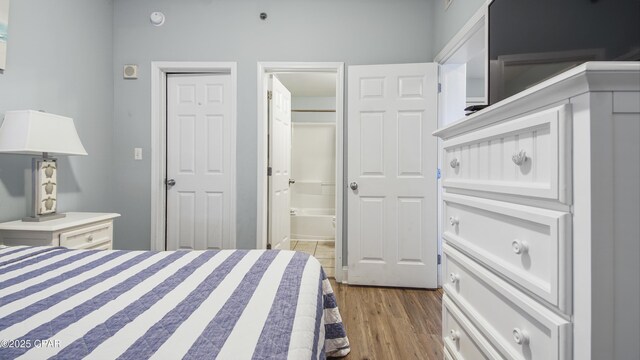 bedroom featuring dark hardwood / wood-style flooring