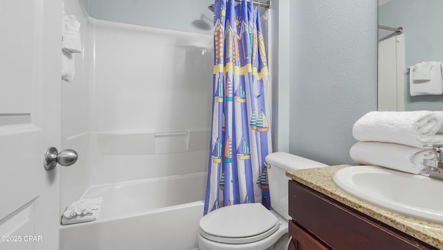 full bathroom with shower / tub combo with curtain, vanity, and toilet