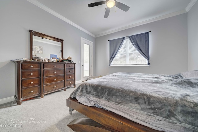 bedroom featuring ornamental molding, light colored carpet, and ceiling fan
