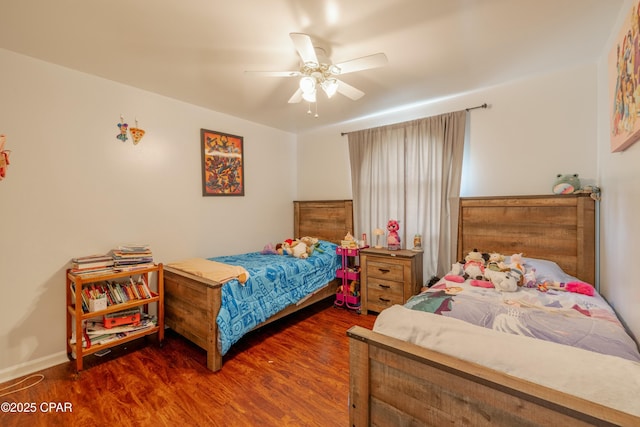 bedroom featuring ceiling fan and wood finished floors