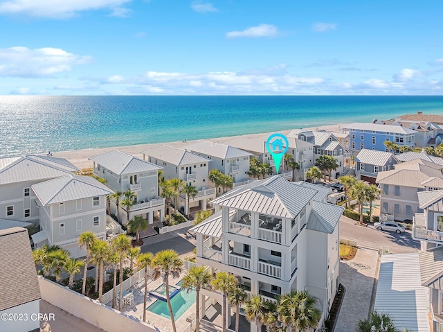 aerial view featuring a water view and a residential view